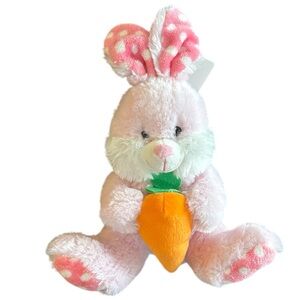 Pink plush bunny with a carrot